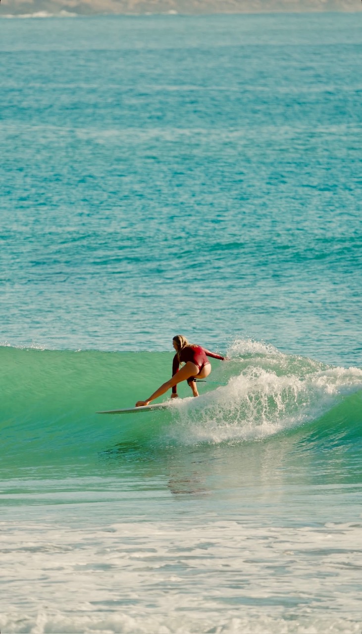 Surfer at sunset in Taghazout, Morocco